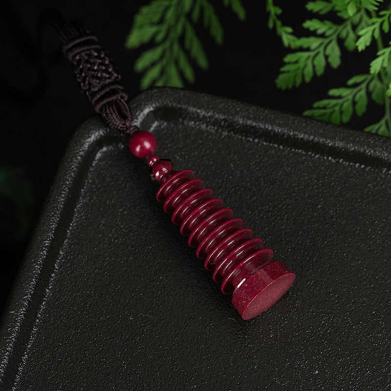 Career - boost cinnabar pendant